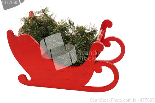 Image of Red Wooden Sleigh And Greens