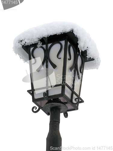 Image of lantern with snow