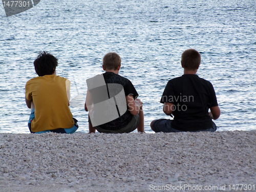 Image of Group of friends by the sea