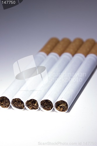 Image of Isolated Cigarettes Under Blue Light