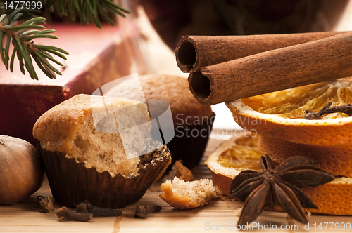 Image of Freshly baked muffins with difrens kind of spieces - christmas d