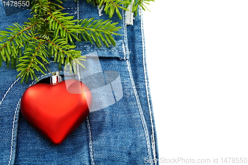 Image of Christmas tree and toy on denim background.