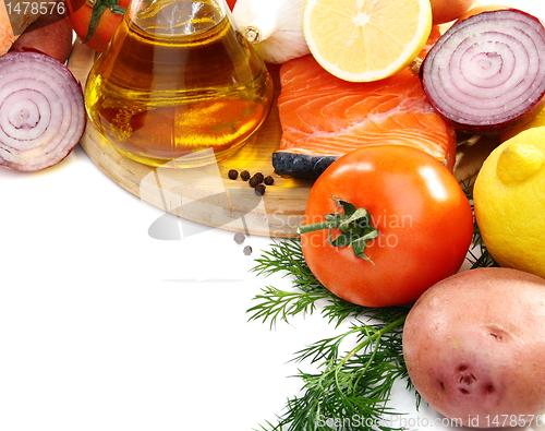 Image of Raw salmon, vegetables and greens.