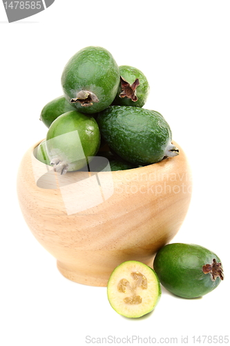 Image of Feijoa fruit in wooden bowl.