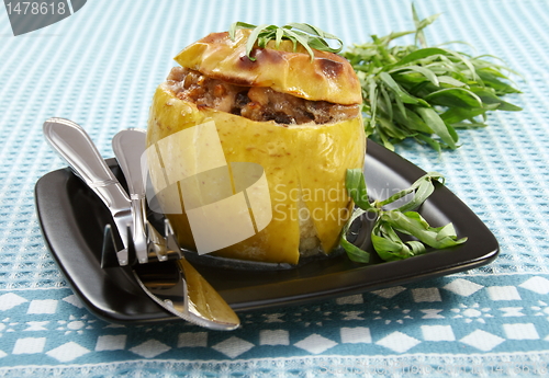 Image of  Apples stuffed with chicken, prunes and walnuts.