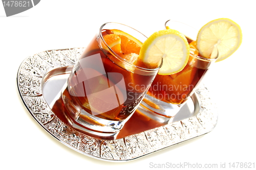 Image of Hot black tea with orange.