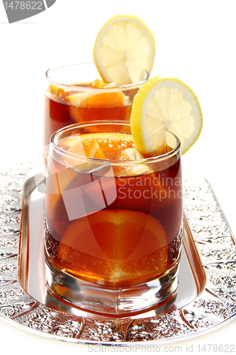 Image of Hot black tea with orange.