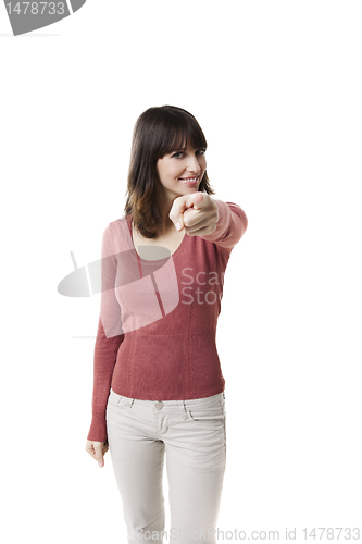 Image of Beautiful woman pointing and smiling