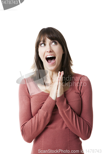Image of Beautiful woman smiling surprised