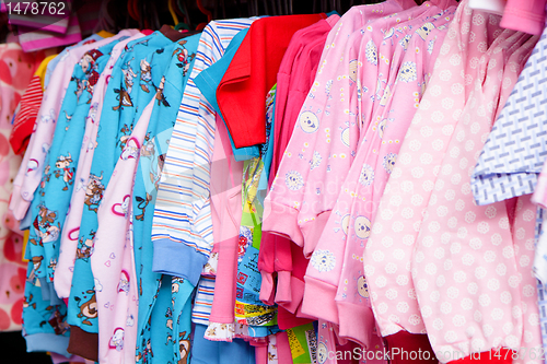 Image of a lot of clothes on a hanger