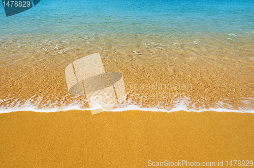 Image of Surf on tropical beach - background