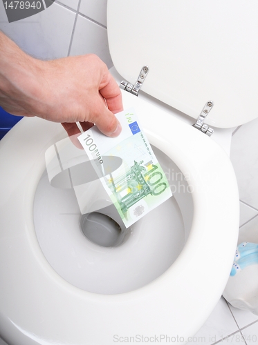 Image of money and toilet