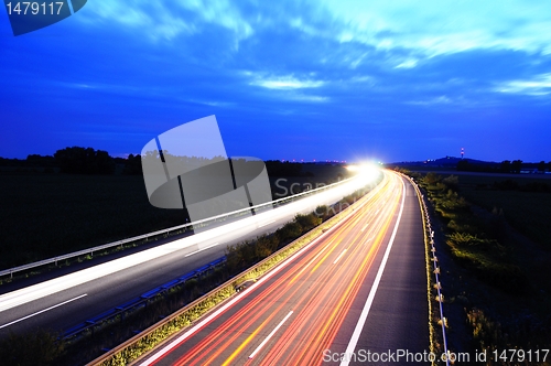 Image of night traffic on highway