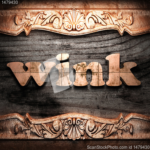 Image of Golden word on wood