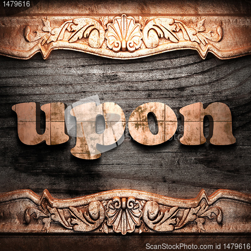 Image of Golden word on wood