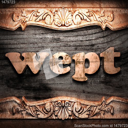 Image of Golden word on wood