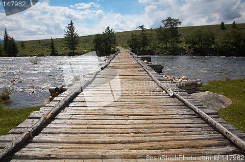 Image of Wooden bridge over river