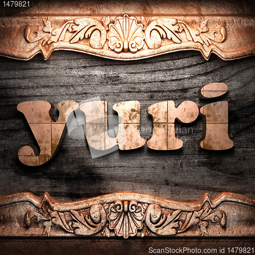 Image of Golden word on wood