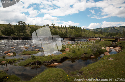 Image of Wooden bridge over river