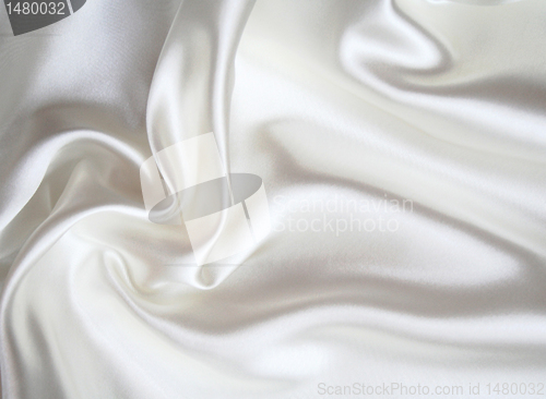 Image of Smooth elegant white silk as background 