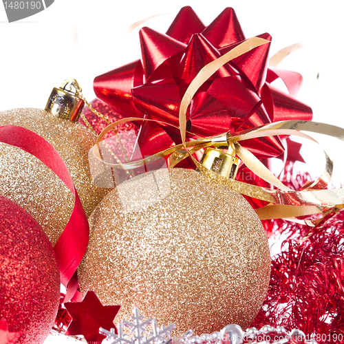 Image of christmas balls with ribbon and tinsel