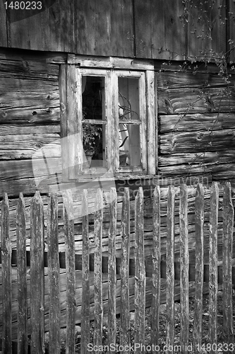 Image of window of old wooden cottage