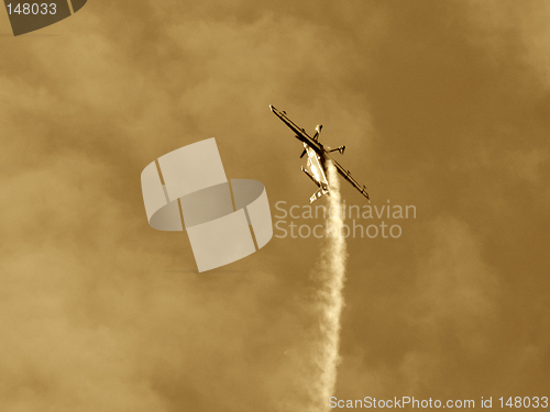 Image of Upside-down plane at the European Aerobatic Championship. Sepia version