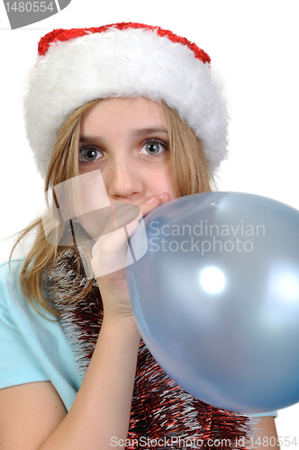 Image of cute xmas girl with a balloon