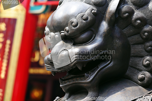 Image of Bronze lion in chinese temple