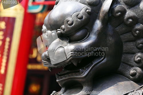 Image of Bronze lion in chinese temple