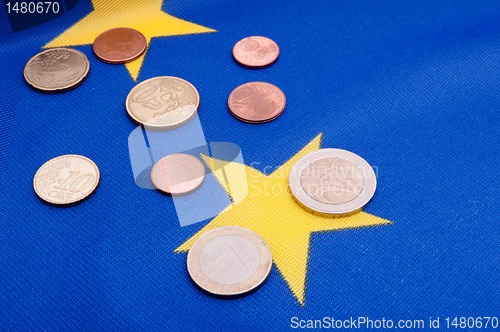 Image of Euro Coins on EU Flag