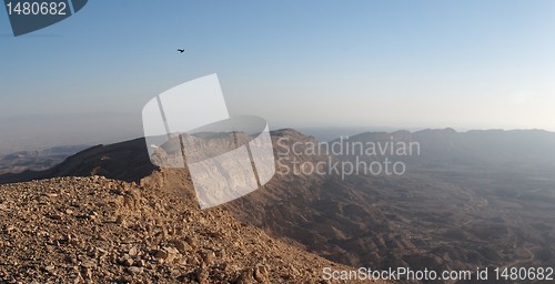 Image of Rim of desert canyon at sunset