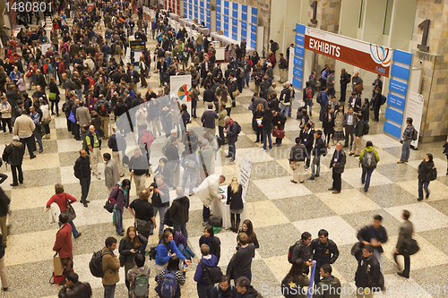 Image of scientists at a conference break