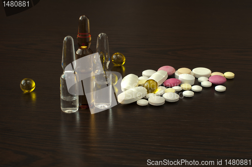 Image of Pile drugs on table