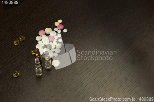 Image of Pile drugs on table