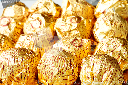 Image of Chocolate wrapped in golden paper