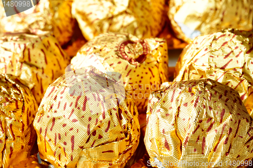 Image of Chocolate wrapped in golden paper