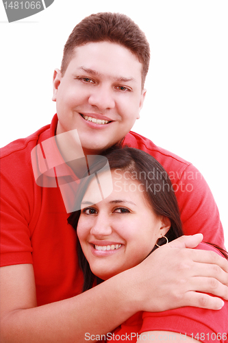 Image of Portrait of a happy young couple having fun together against whi