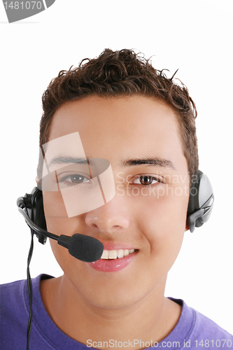 Image of Smiling young man with telephone headset isolated on white backg