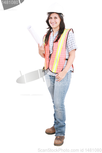 Image of Young architect woman wearing a protective helmet, standing. Iso