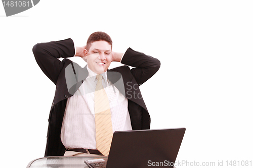 Image of Young business man relax with happily after working 