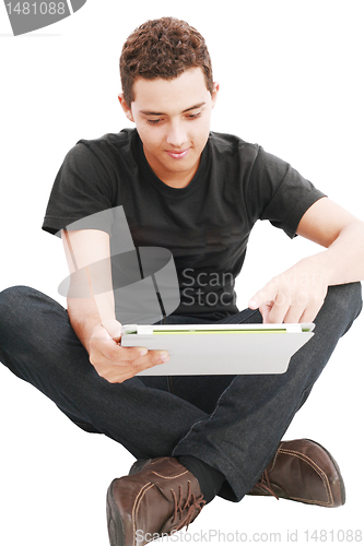 Image of Young man using a touch pad PC, isolated on white