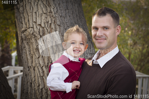 Image of Handsome Father and Son in the Park