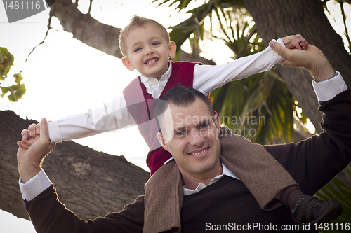 Image of Handsome Father and Son in the Park