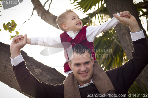 Image of Handsome Father and Son in the Park