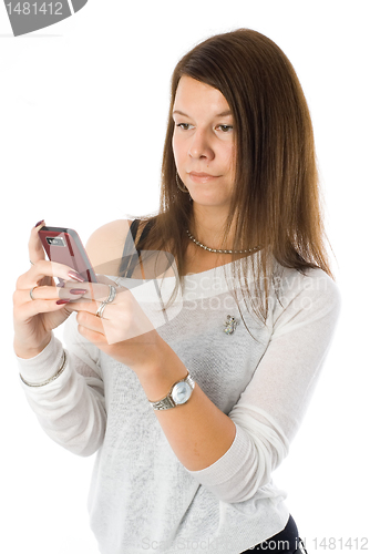 Image of Pretty woman talking by mobile phone