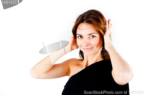 Image of Hear no evil - Young woman covering her ears