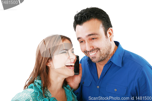 Image of couple listening something in mobile cellphone