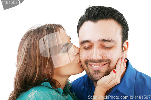 Image of Lovely woman kissing her boyfriend, isolated on white