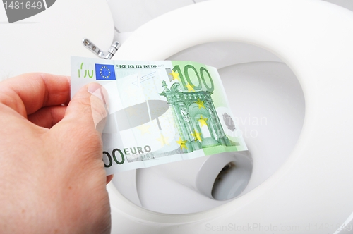 Image of money and toilet